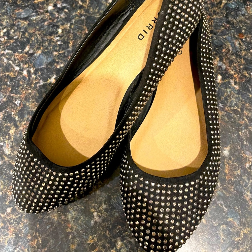 Size 10.5 Wide, Torrid flats — Black with silver spikes.